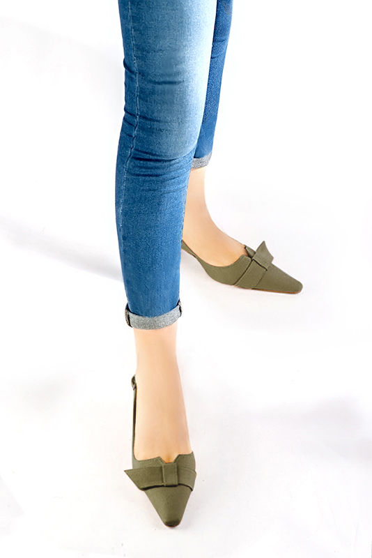 Khaki green women's open back shoes, with a knot. Tapered toe. Medium spool heels. Worn view - Florence KOOIJMAN